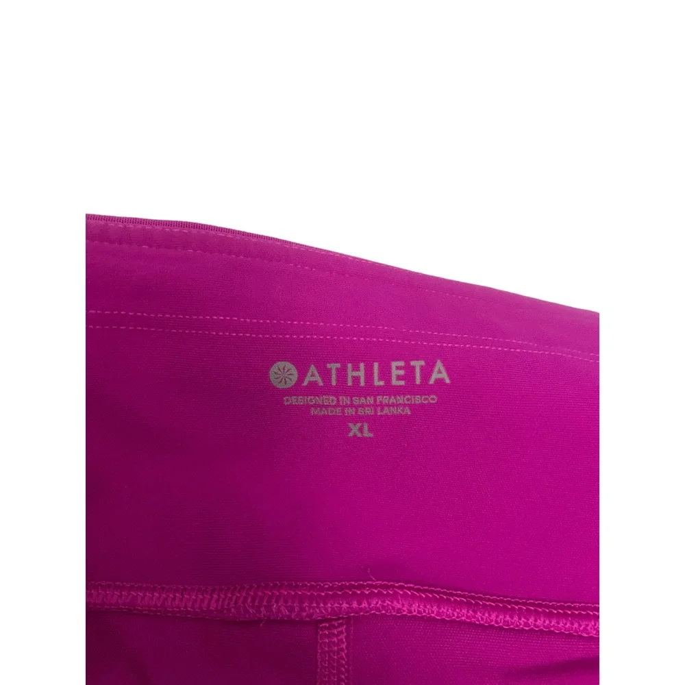 Athleta XL Fuschia Skort Pockets (two small‎ snags) See images